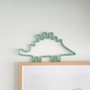 Knitted dinosaur wall sign for kidsroom decor, dinosaur knitting decoration diplodocus or stegosaurus or tyrex