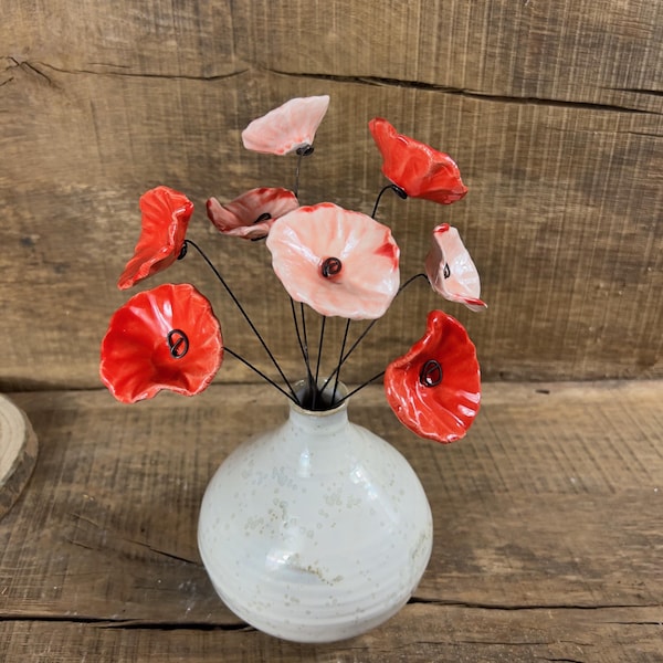 8 small red poppy and red-white ceramic flowers on wire