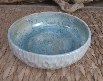 Large bowl or small salad bowl in enameled stoneware made on a potter's wheel, water green and white, textured exterior