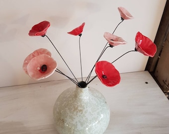 8 small poppy red and red-white ceramic flowers on wire