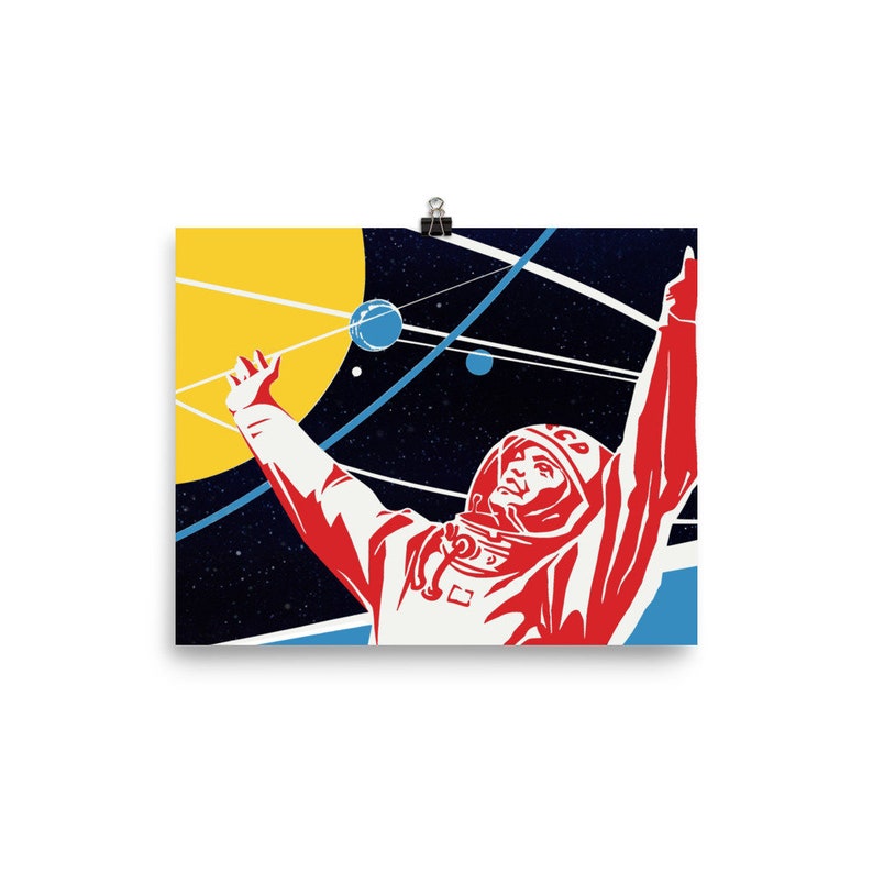 May include: A retro-style poster featuring a red and white astronaut in a space suit with his arm raised, against a dark blue background with yellow and blue planets and stars.