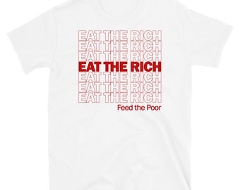 May include: White t-shirt with the phrase "EAT THE RICH" repeated in red text, with the words "Feed the Poor" at the bottom.