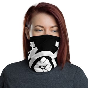 May include: A black and white face covering with a raised fist design. The mask is made of a soft, breathable fabric and is designed to be comfortable to wear.