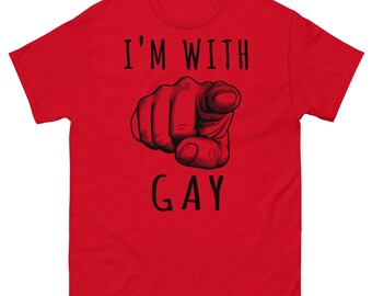 May include: Red t-shirt with a black graphic of a pointing hand and the text "I'm with Gay".