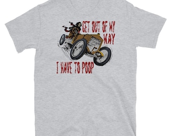 May include: A gray t-shirt with a cartoon image of a skeleton driving a vintage car. The text on the shirt reads "Get out of my way I have to poop."