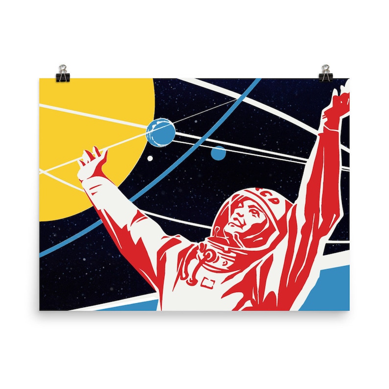 May include: A retro-style poster featuring a red and white astronaut in a space suit with his arm raised, against a dark blue background with yellow, blue, and white planets and stars.