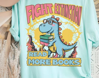 Funny Bookish Dinosaur T-Shirt: Fight Extinction, Read More