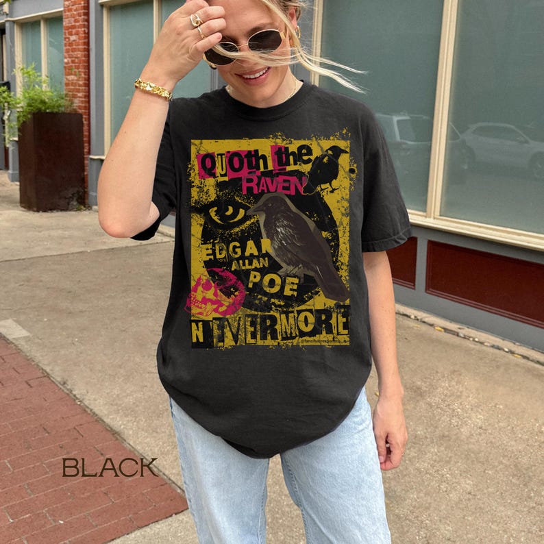 May include: Black t-shirt with a graphic design inspired by Edgar Allan Poe's poem "The Raven." The design includes the text "Quoth the Raven," "Edgar Allan Poe," and "Nevermore," along with an illustration of a raven.