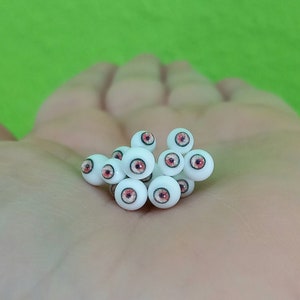 PAIR OF EYES monster resin glass 4mm. red iris 1,8 mm. For dolls, miniatures, ornaments.