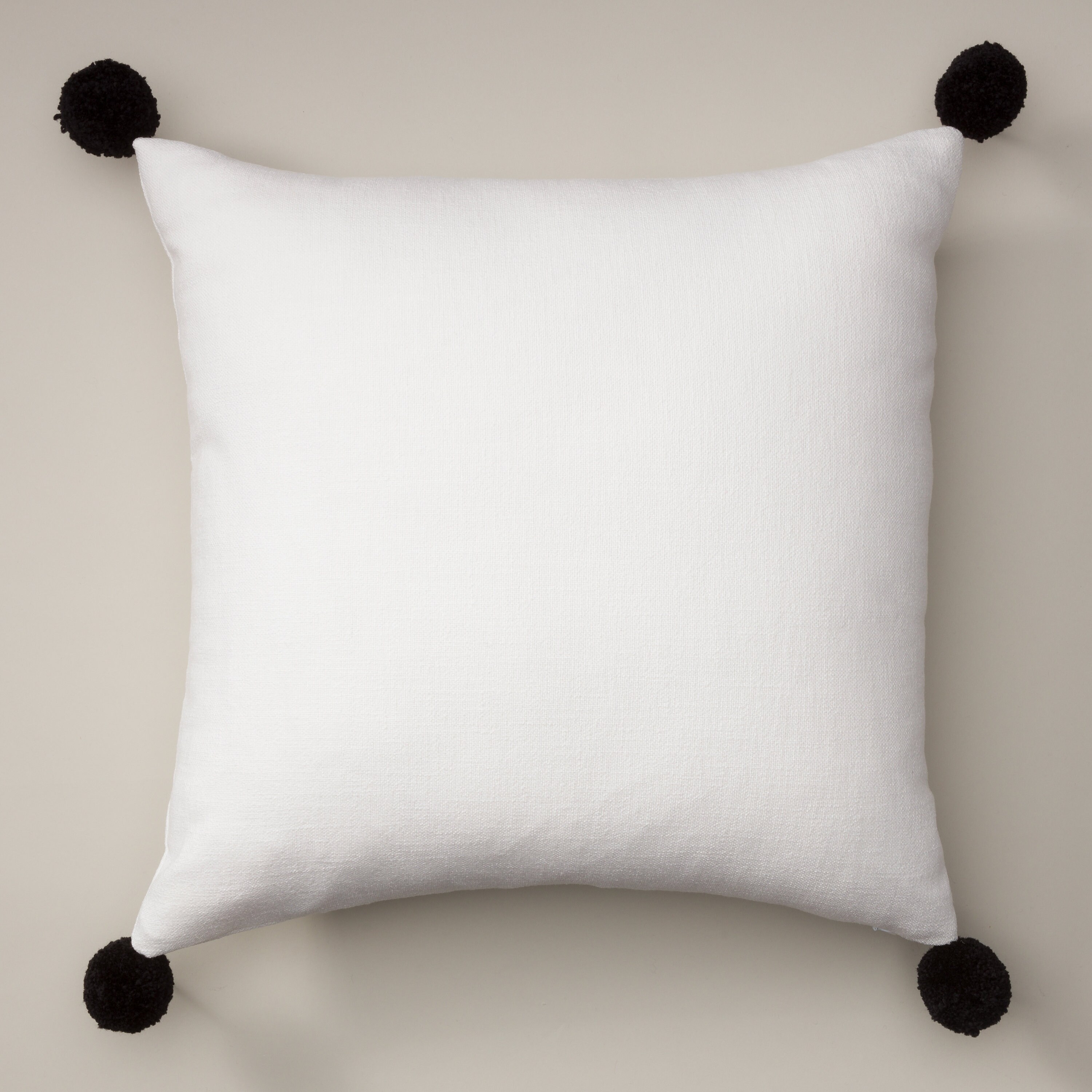 Black and white pom pom pillow sales
