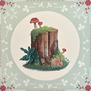 May include: A watercolor illustration of a tree stump with mushrooms and a small rabbit. The stump is covered in green moss and surrounded by grass and plants. The background is a light blue with a floral border.