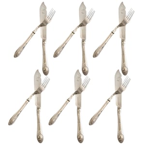 May include: Six silver-colored fish forks and knives set against a white background. The forks are positioned diagonally, paired with knives. The handles feature ornate floral designs, suggesting a vintage or antique style. The set is ideal for formal dining.