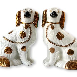 Antique Staffordshire Copper Lustre Dogs