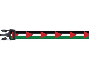 May include: A black and white strap with red triangles and a green stripe, featuring a black plastic buckle. The design is repeated along the length of the strap, creating a patterned effect.