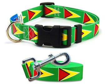 May include: Green, yellow, and red dog collar and leash with the flag of Guyana printed on them. The collar has a black plastic buckle and a silver D-ring. The leash has a silver clip.