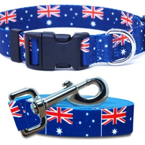 May include: A blue and red dog collar and leash with the Australian flag design. The collar has a black plastic buckle and a silver D-ring. The leash has a silver hook.