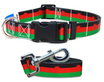 May include: Black, red, and green dog collar and leash with the flag of Malawi printed on them.