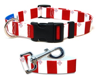May include: Red and white dog collar and leash with a red cross pattern, representing the flag of England.