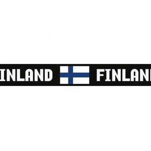 May include: A black strap with the word "FINLAND" in white letters, repeated twice, and two Finnish flags. A black plastic buckle is attached to the left side of the strap.