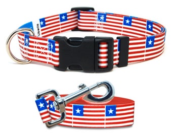 May include: A red, white, and blue dog collar and leash with the Liberian flag pattern. The collar has a black plastic buckle and a silver D-ring. The leash has a silver clip.