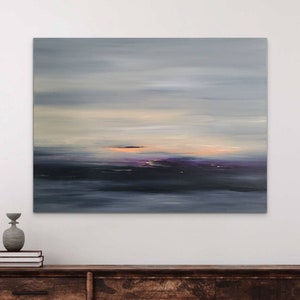 May include: Abstract painting of a sunset over a dark body of water. The sky is a soft gray with hints of pink and orange. The water is a deep blue with streaks of purple.
