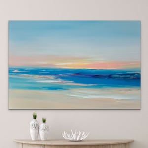 May include: Abstract painting of a seascape with blue, white, and pink hues. The painting depicts a calm ocean with a soft, pastel sky.