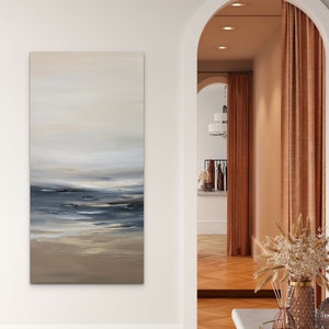 May include: A painting of a seascape with a light blue sky, white clouds, and a dark blue ocean with white waves. The painting is in a modern style and has a calming effect.