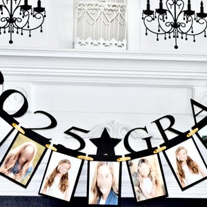 May include: Black and gold graduation banner with the year 2025 and the word "GRAD" in large letters. The banner has spaces for photos, and there are photos of people in the spaces.