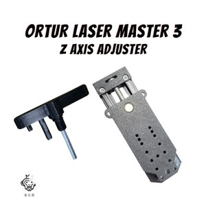 May include: Black 3D printed Z-axis adjuster for an Ortur Laser Master 3. The adjuster has a threaded rod and a knob for adjusting the height of the laser head. It also includes a small black wrench for tightening the knob.
