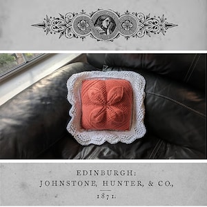 May include: A coral-colored knitted pillow with a white crocheted border. The pillow has a floral design and is sitting on a brown leather couch.