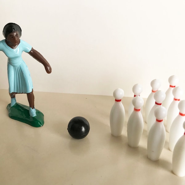 Deportes - Bowling w/ Pins (Afro/America-Female)
