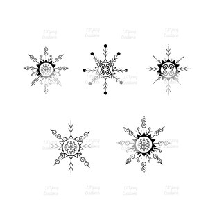 May include: Five black and white snowflake designs with intricate details. Each snowflake has a central circle with a geometric pattern.