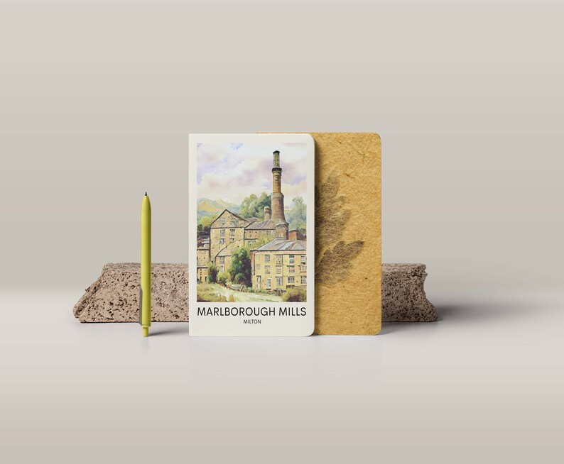 May include: A vintage postcard featuring a watercolor illustration of Marlborough Mills in Milton. The postcard is cream colored with brown text and a brown border. The illustration depicts a brick building with a tall chimney and a row of windows.