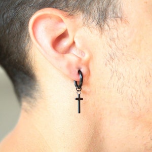 Black dangle cross earring top