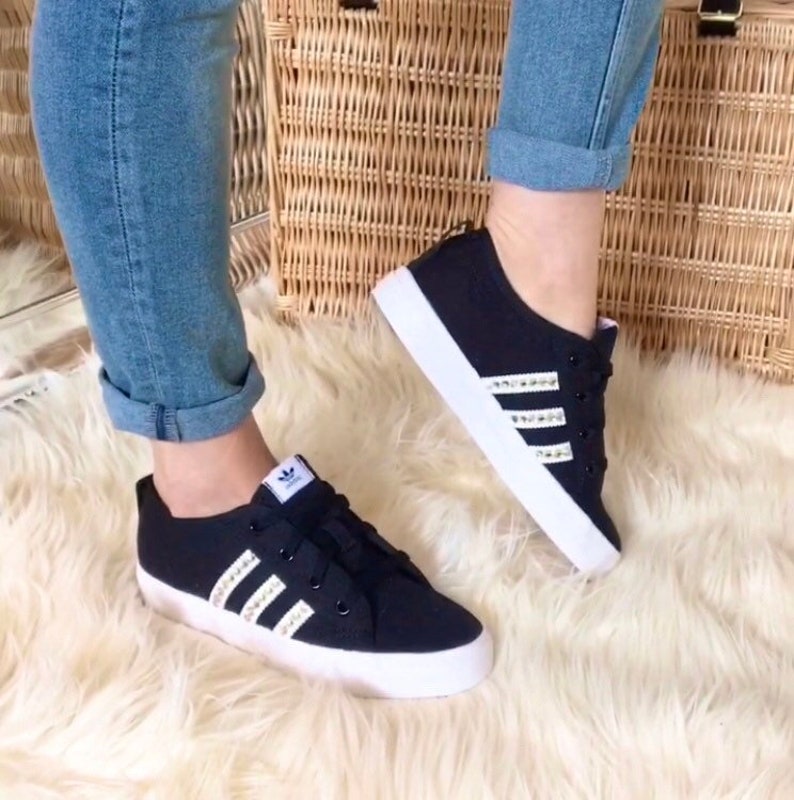 black and gold adidas trainers