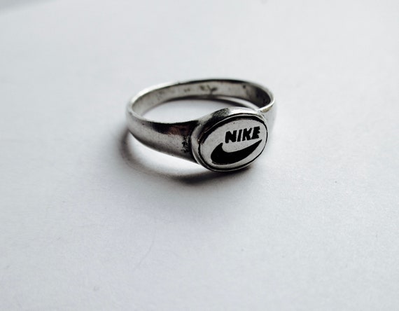 nike logo silver