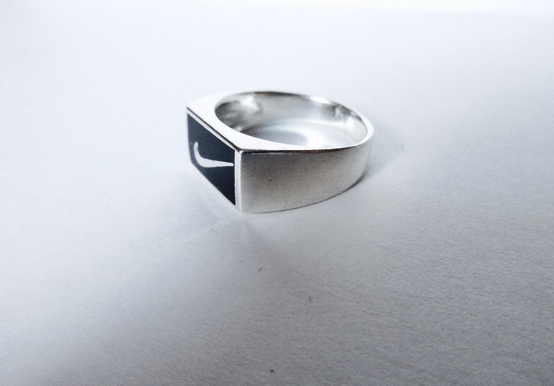 nike logo silver
