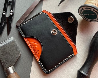 Leather pocket business card holder in black with orange. Compact, minimalist cash and credit card wallet for men. Handmade from Ukraine.