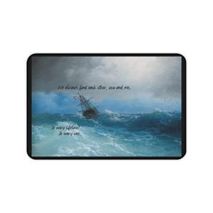 May include: A stormy seascape painting with a ship sailing through rough waves. The painting has the text "We always find each other, you and me. In every lifetime? In every one."