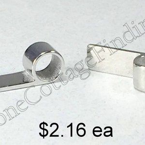 May include: Two silver metal ring and bar connectors. The ring connector has a flat bar with a ring on the end. The bar connector has a flat bar with a ring on the end.  $2.16 ea