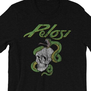May include: Black t-shirt with a green snake wrapped around a skull and the word "Pelosi" in a stylized font.