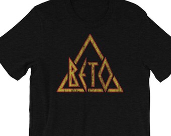 May include: Black t-shirt with a yellow and red triangle design featuring the word "BETO" inside.