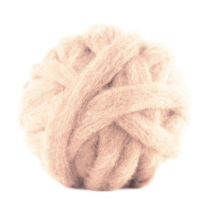 May include: A ball of light brown wool yarn, ideal for knitting or crocheting.