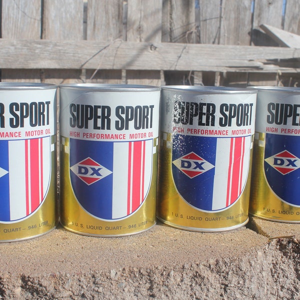 DX Super Sport 30 wt. oil containers "cans". Please look at pictures. This is for four (4) cans. Close out of remaining cans I have