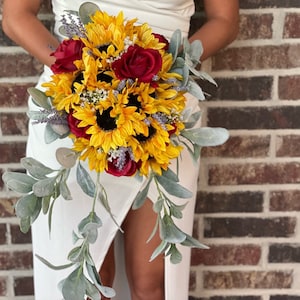 Cascading red roses sunflowers and lavender bouquet Sunflower wedding Red roses bouquet Red roses and sunflowers