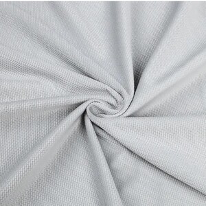 May include: Close-up of a light gray fabric with a woven texture. The fabric is swirled in a spiral pattern, creating folds and shadows. The material appears soft and pliable, suitable for clothing or home decor.