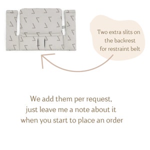 May include: A light beige high chair cushion with a geometric pattern in gray. The cushion has two slits for a restraint belt. Text on the image says, "Two extra slits on the backrest for restraint belt."
