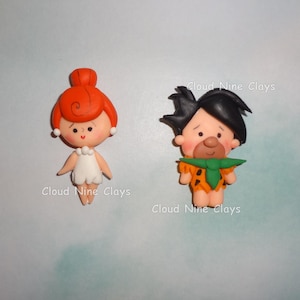 1* stone age cartoon characters Wilma or Fred clay doll flat back embellishment bow center jewelry lanyards crafts badge reel