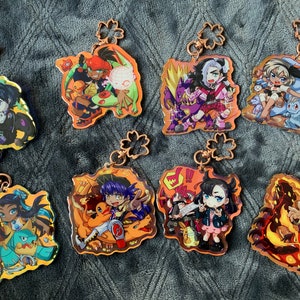 Gym Leader Inspired Rainbow Holo Charms