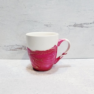 a hand warming coffee mug Clay in Motion Handwarmer Mug - Mocha